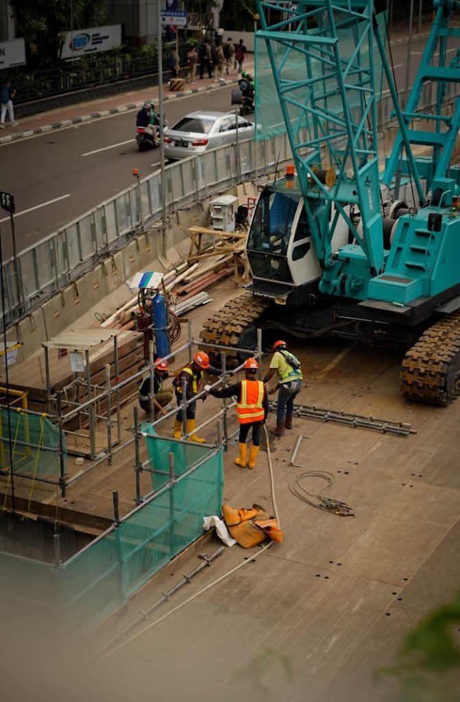 pexels photo 14590528 A bustling construction site in Jawa Barat, Indonesia featuring workers and machinery.